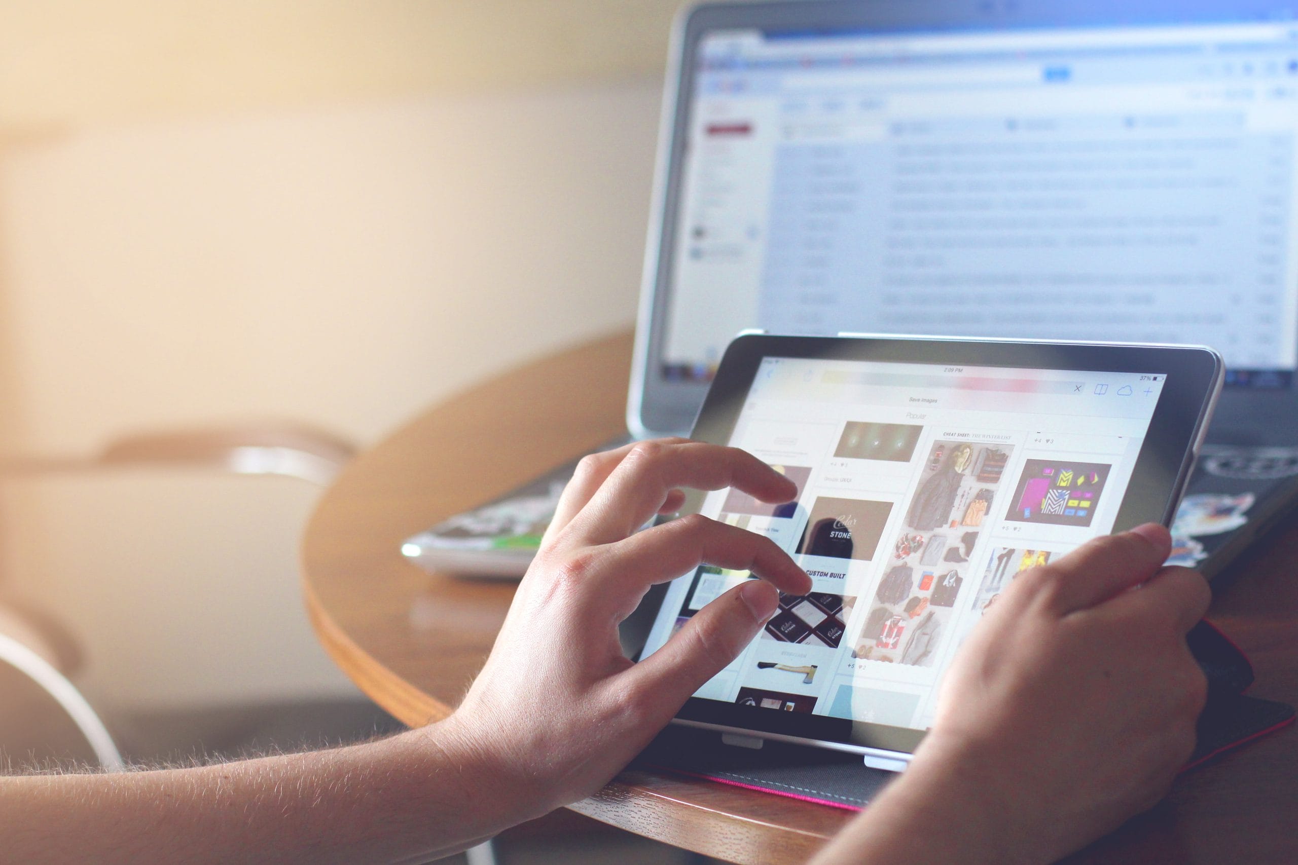 A person using a tablet computer in the Mac App Ecosystem.