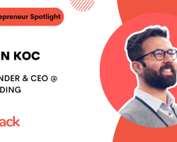 Image of a "BizStack Entrepreneur Spotlight" featuring Osman Koc, Co-Founder & CEO at Userguiding. The image showcases Osman Koc smiling against a blurred red and white background.